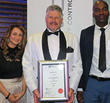 Left to right: Xandri Cornelissen (secretary and publications), Johan Maritz (chairman) and 
John Phala (site visits) with the award.